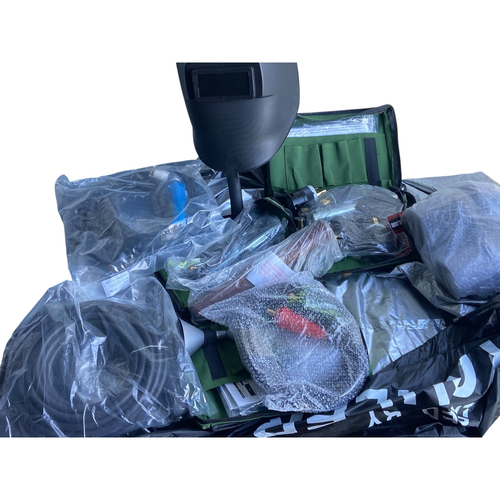 Kohler 9250 4-in-1 jobsite tool featuring a generator, plasma welder, air compressor, and remote start in a work setting.